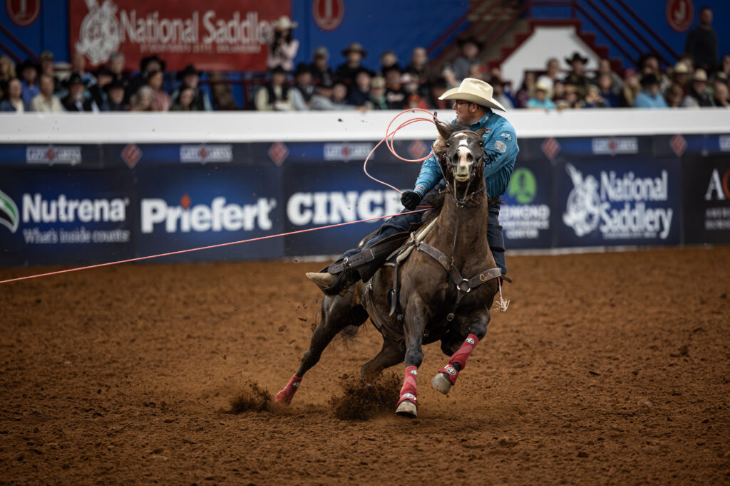 Coleman Proctor turns a steer