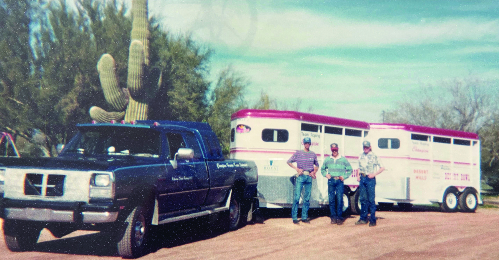 Fifteen-year-old Kevin Schreiner with Rickey Green and Shane Dougapole and their trophy trailers