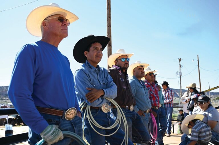 Clay Cooper, Derrick Begay, Erich Rogers, Ty Romo, Myles John and Aaron Tsinigine standing together with ropes at the Home of the Navajo PRCA Rodeo