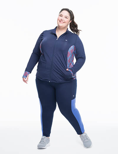 Eleven by Venus Williams in plus size blue leggings and zip-up top