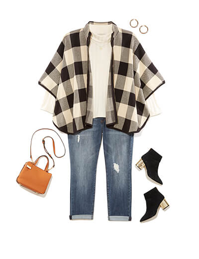 Winter outfit featuring turtleneck under checkered cape.