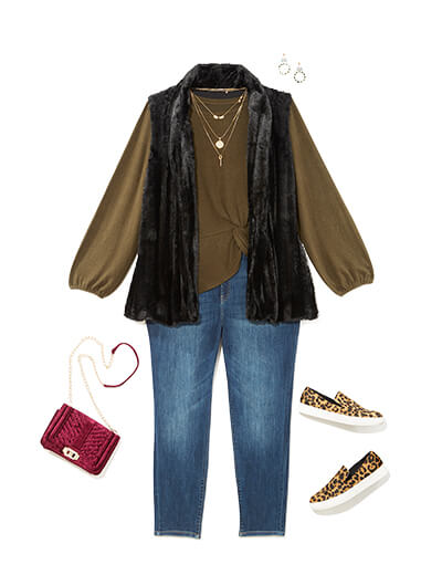 Winter outfit featuring a blouse under a faux fur vest.