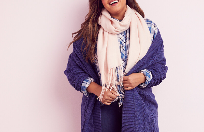 Model in winter layers.