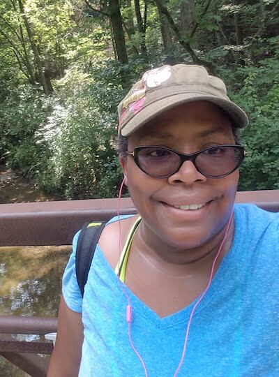 Bisa, hiking to train for her trip
