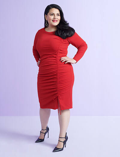 women who inspire what i see in her nadia boujarwah plus size red dress power pose