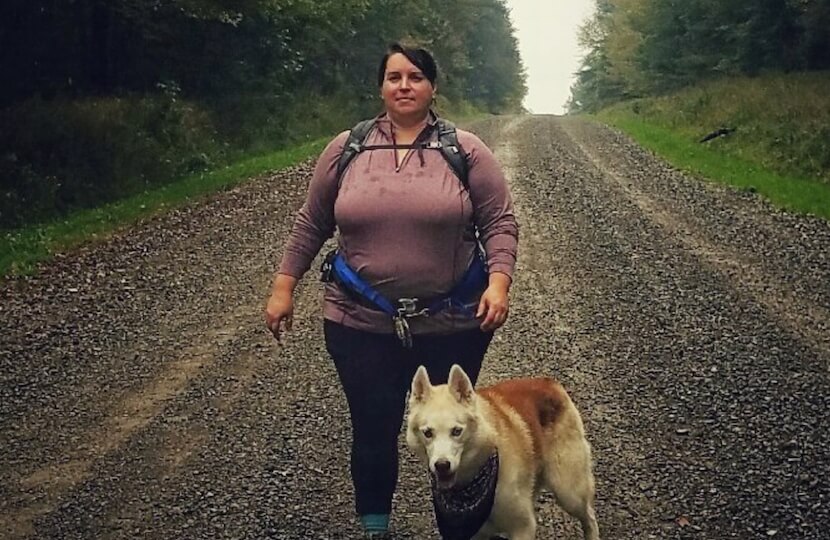Andrea DiMaio on a hike with her dog, Rammu.