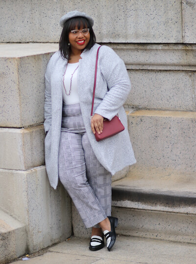Jami in a stylish plus-size workwear ensemble.