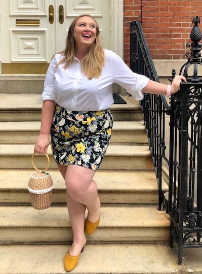 Ashby in a preppy outfit featuring a white button-down.