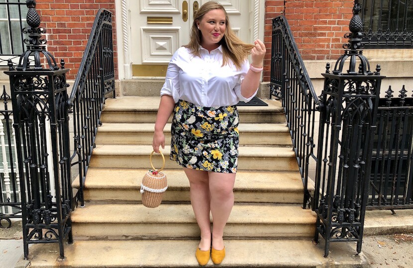 Ashby in a preppy outfit featuring a white button-down.