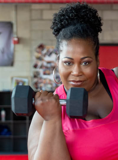Terri Smith lifting weights.