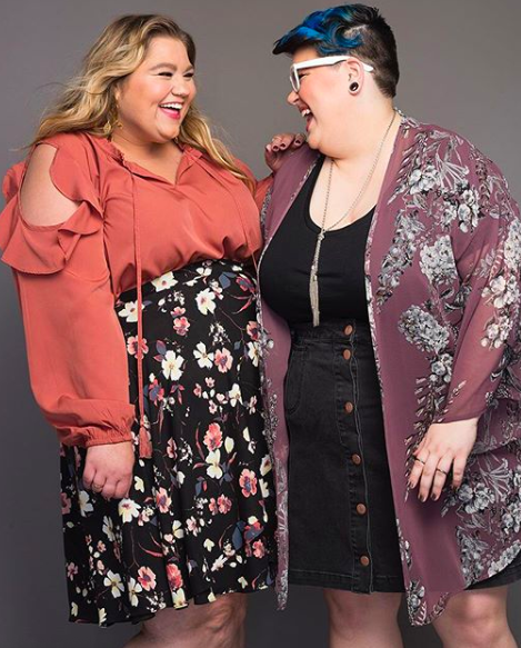 two women laughing in plus size fall boho clothes