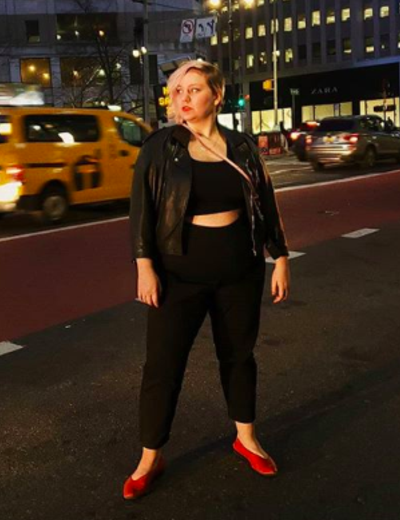 plus size lgbtq influencers laura delarato black crop top black pants moto jacket