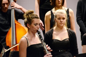 Cheryl accompanies the choir.