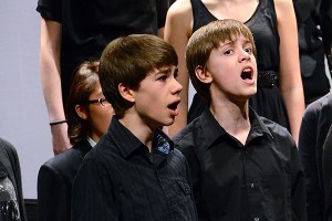 Drew and Jason perform with the choir Saturday. Images courtesy Chris Newel
