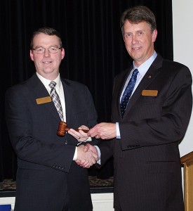 Dave Struthers, left, accepts the president's gavel from outgoing president Dave Butler during the Cranbrook Chamber of Commerce's annual Citizen of the Year Dinner Jan. 23 at the Heritage Inn. Ian Cobb/e-KNOW