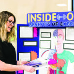 College Nursing and Kinesiology students holding health fair