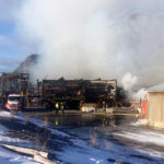 Four fire departments respond to old planer mill blaze