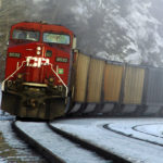 No injuries in logging truck and train collision