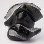 Metamorphosis in soapstone and painting