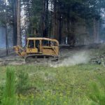 Dozer completes machine guard around wildfire perimeter