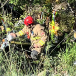 Firefighters rope rescue injured motorcyclist