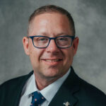 MLA Davis stands with party as rift widens