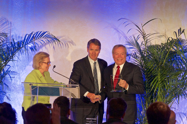 Dave Whitman accepting award