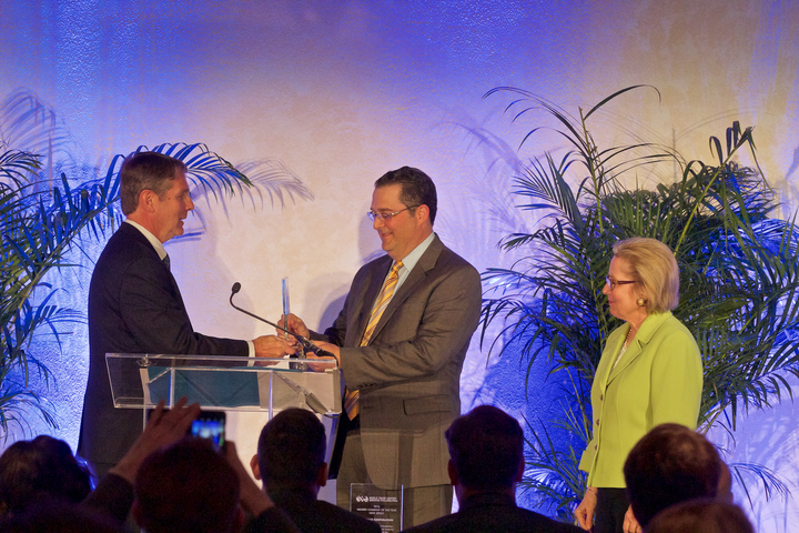 Bruce Carnevale accepting award