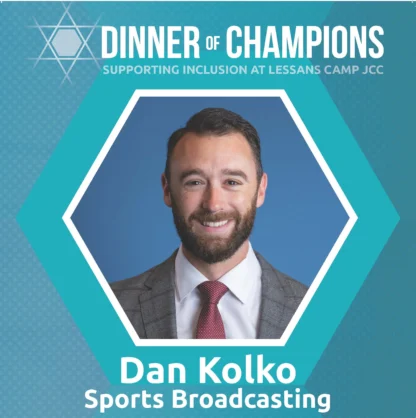 A man in a suit and tie smiles in a professional photo with text reading "Dinner of Champions: Dan Kolko, Sports Broadcasting, Supporting Inclusion at Lessans Camp JCC.