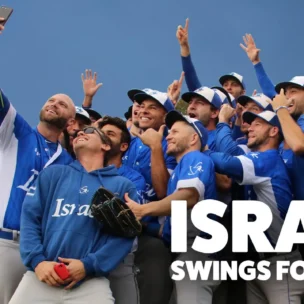 A group of baseball players in Israel uniforms take a selfie together, holding an Israeli flag; text reads "Israel Swings for Gold.