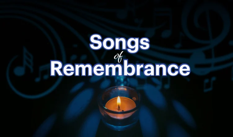 A lit candle sits in front of the words “Songs of Remembrance” with musical notes in the background.