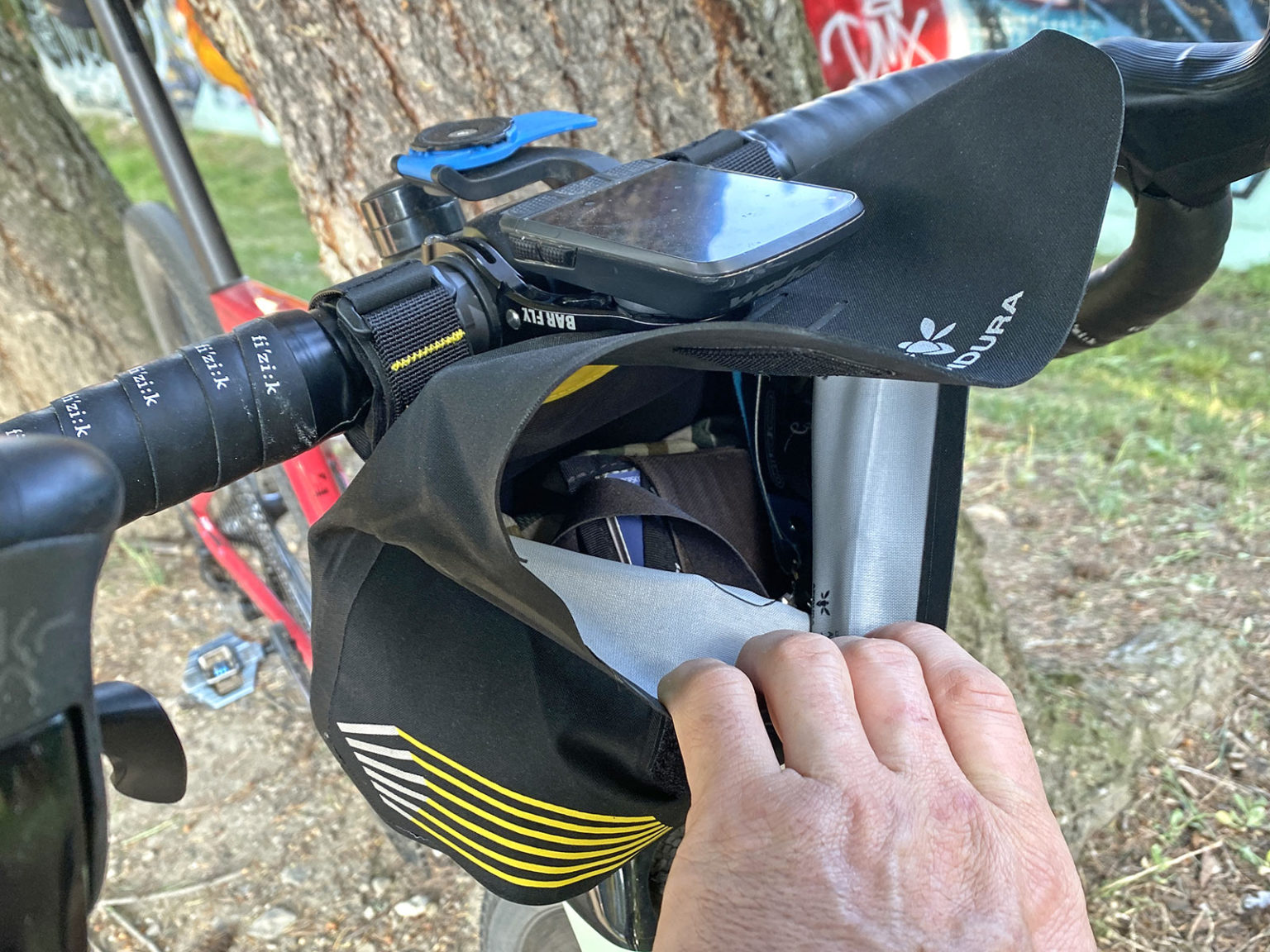 Apidura Racing Handlebar Pack mini bikepacking bar bag Bikerumor
