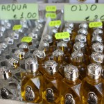 Holy water and miracle oil — some of the many Pio-related souvenirs for sale in San Giovanni Rotondo. | Photo by Andrea Palatnik.