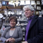 Rodolfo San Rafaelle (right) and his wife (left) at their small souvenir shop in San Giovanni Rotondo. | Photo by Teresa Mahoney. Rodolfo San Rafaelle (right) and his wife (left) at their small souvenir shop in San Giovanni Rotondo. | Photo by Teresa Mahoney.