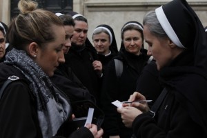 Teresa Mahoney interviewing nuns. l Photo by Trinna Leong.