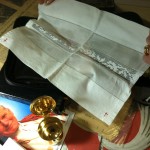 As a Eucharistic Minister, Illuzzi prepares the consecrated host. | Photo by Ines Novacic.