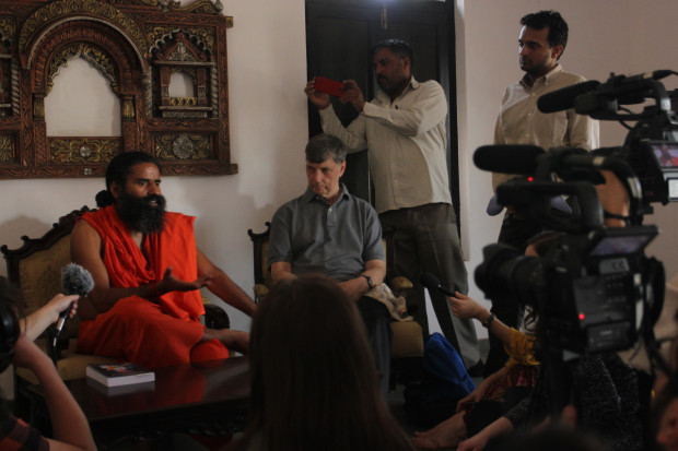 Spiritual leader Baba Ramdev speaks with India Yatra reporters, addressing the role of yoga, Vedic tradition, and the media. Photo by Arielle Dreher.