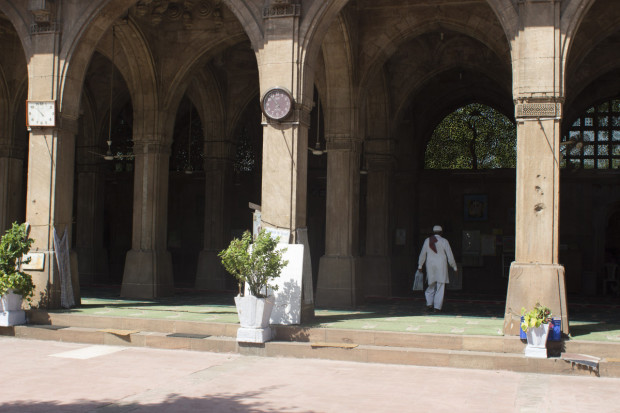 The Sidi Sayied Mosque is known for the carved windows depicting a bodhi tree and a palm tree intertwined, which is the unofficial symbol of the city of Ahmedabad. Photo by Darcy Coulter.