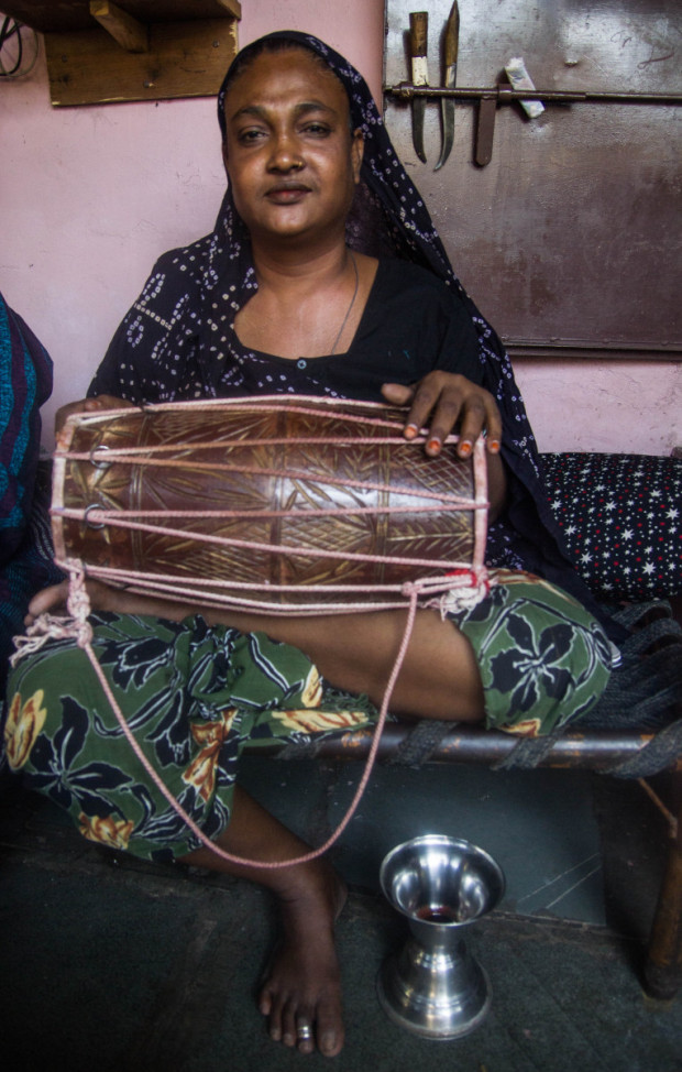 Joya holds a dolak which was passed on from one hijra to another in Ahmedabad.