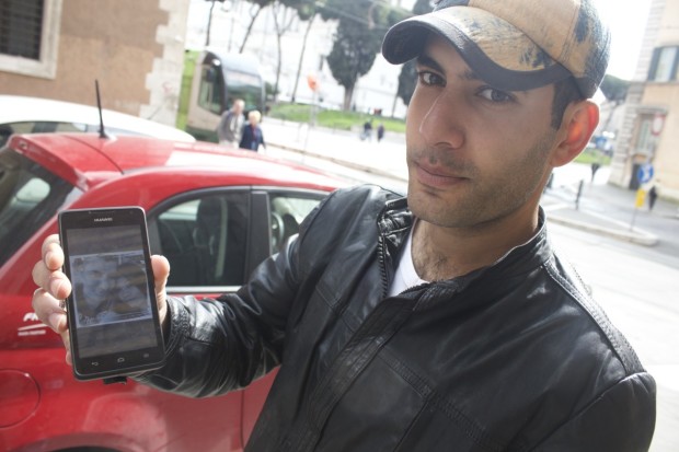 At Rome’s Piazza Venezia, Mohammad Nabash, 29, spends his days texting and chatting online with friends and family back home in Iran.   He visits the piazza to use a free Wi-Fi spot through his phone, arriving in the mornings to speak with Juliana, his wife who lives in Jakarta, Indonesia. Despite a five-hour time difference, their love continues to evolve through difficult times. Nabash traveled from Iran to Rome two months ago and is one of the 150,000 immigrants who have arrived in Italy since 2014 seeking asylum, according to the International Organization for Migration.  The conflict between the Iranian government and ISIS forced him to leave his homeland, Nabash said, where he had a family and work.   “My father had a small market, and I worked with him,” Nabash said. “Here, I am looking for a job.”   His days in Iran now over, he sees Italy as his new country.   “This country and the Catholics are doing everything for me,” he said. “They gave me my papers and I have food thanks to them.”   Nabash is one of the 90 refugees served by Centro Astalli in Rome, which is run by the Jesuit Refugee Service. Although he was born Muslim, he said he would consider converting to Christianity.   “The Church is good. They help people. I could be Christian," Nabash said, trying to explain how grateful he is for the that has helped him.   During the last few weeks, he has been looking for a job. He plans to learn Italian to he can finally find work.   “I know how to sell things. I am a good worker,” he said,   His love, Julia, is waiting for that job too, because she will travel to Rome once he’s employed. He hopes one day they will have a life of opportunity in Italy. 
