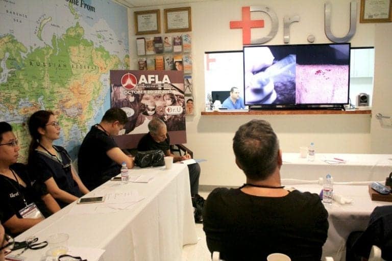 ISHRS members watch live surgery demonstrations of Dr. Umar demonstrating his Dr.UPunch Rotor intelligent ™ device to perform body hair extractions on an actual patient case