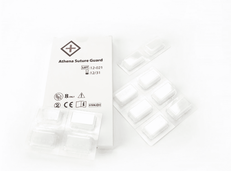 The Athena Tension Suture Guard is a specially invented and patented tension suture kit by Dr. Sanusi Umar to help close surgical wounds from AKN removal surgery. The Athena Tension Suture Guard is a specially invented and patented tension suture kit by Dr. Sanusi Umar to help close surgical wounds from AKN removal surgery.