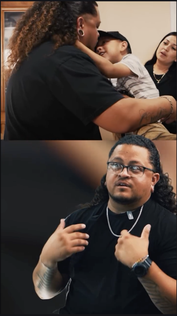 Split video image showing an adult holding a young child above Juan speaking during an interview.