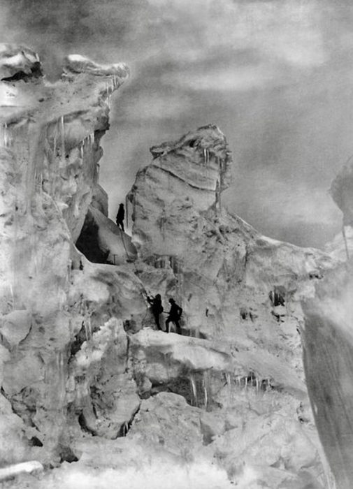 Luigi Amadeo and guides climbing an icefall on Chogolisa in 1909.