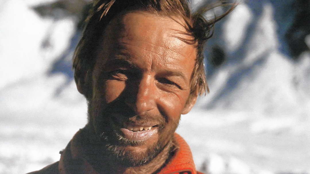 Portrait of Schnell against a snowy peak