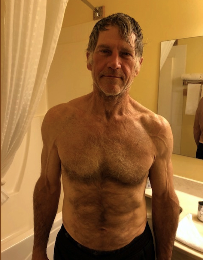 portrait of shirtless West Hansen