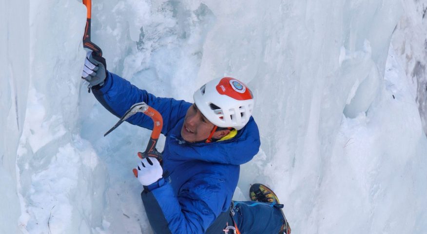 the climber on a vertical ice section.