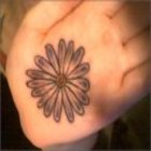 A_flower_in_hand_of_the_buddha
