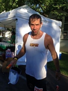 Michael Miller with a wet head and a popsicle staying cool at States