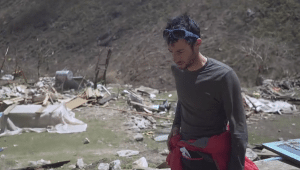 Kilian Jornet surveys bodies in Langtang Valley